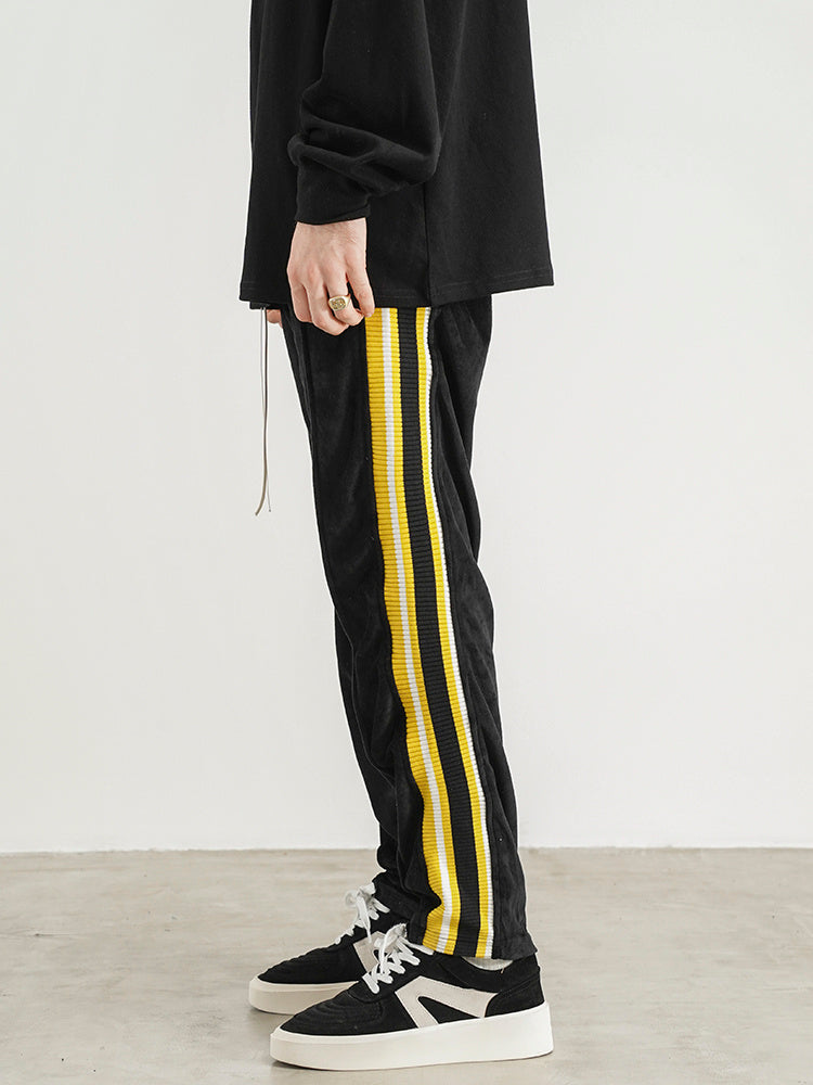 Pantalones de chándal de terciopelo con cinta lateral a rayas