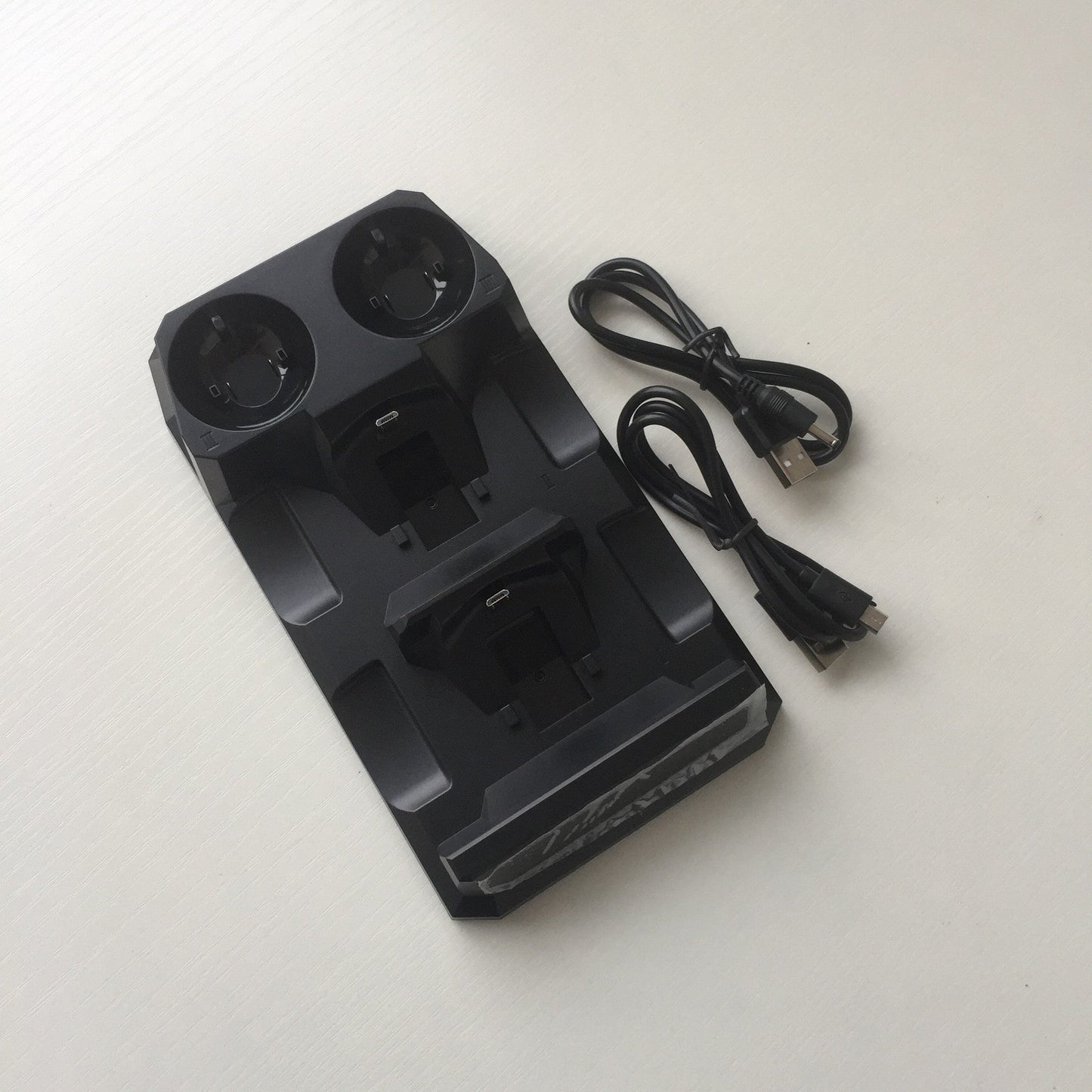 Cargador multifuncional para mando de PS4