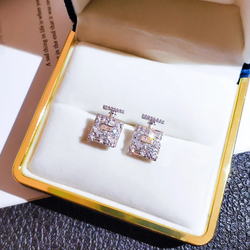 Perfume Bottle Stud Earrings | Sterling Silver Dazzling Zirconia Jewelry