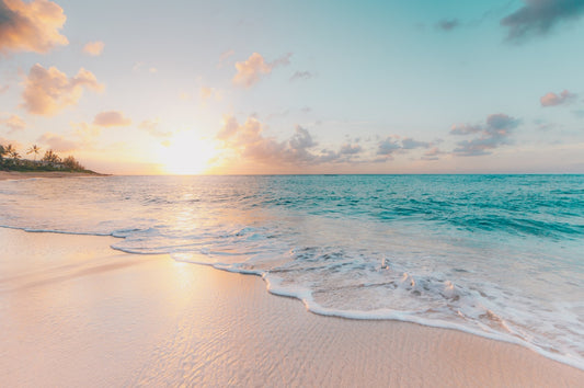 Peaceful tropical beach with crystal clear turquoise water and white sand