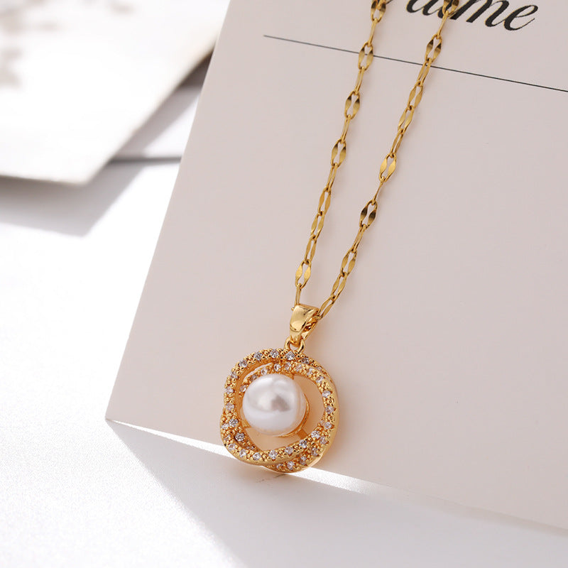 Collier en acier au titane pour femme avec pendentif creux nid d'oiseau imitation perle
