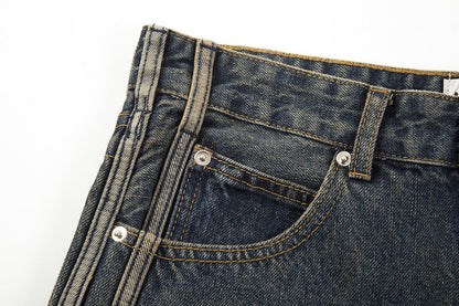 Vaqueros vintage acampanados con cremallera a rayas