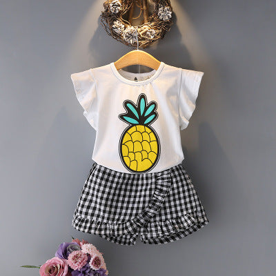 Traje de dos piezas de top de piña y culottes a rayas para niña