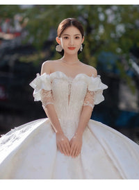 Robe de mariée principale en satin blanc, nouvelle robe de défilé de princesse, robe de mariée de tempérament, douce traîne.
