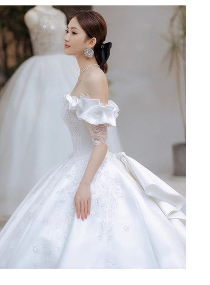 Robe de mariée principale en satin blanc, nouvelle robe de défilé de princesse, robe de mariée de tempérament, douce traîne.