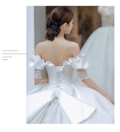 Robe de mariée principale en satin blanc, nouvelle robe de défilé de princesse, robe de mariée de tempérament, douce traîne.