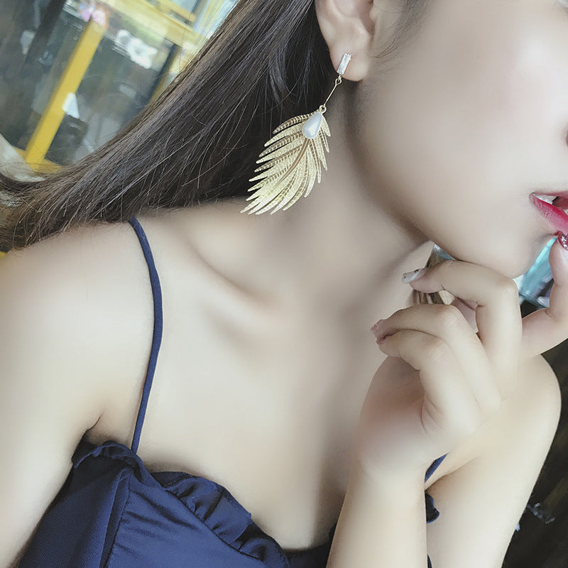 Boucles d'oreilles pendantes Feuille creuse Perle Nouveau tempérament coréen pour femme