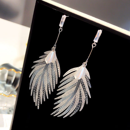 Boucles d'oreilles pendantes Feuille creuse Perle Nouveau tempérament coréen pour femme