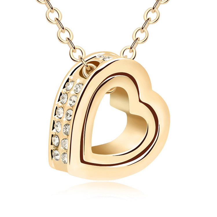 Collar corto con colgante de corazón doble de cristal