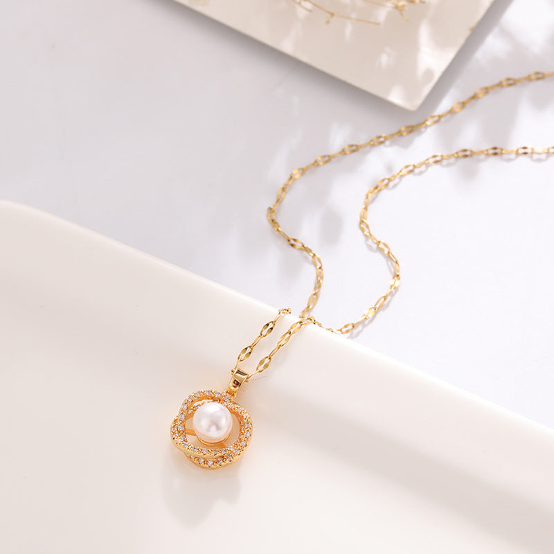 Collier en acier au titane pour femme avec pendentif creux nid d'oiseau imitation perle