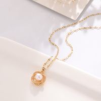 Collier en acier au titane pour femme avec pendentif creux nid d'oiseau imitation perle