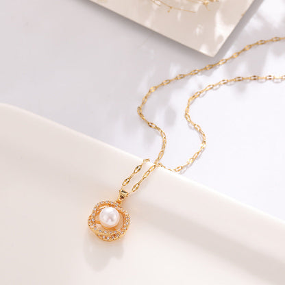Collier en acier au titane pour femme avec pendentif creux nid d'oiseau imitation perle