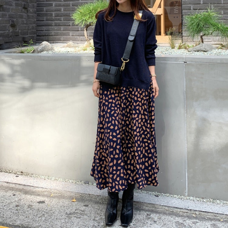 Robe longue grande taille à manches longues avec imprimé patchwork et grand ourlet.