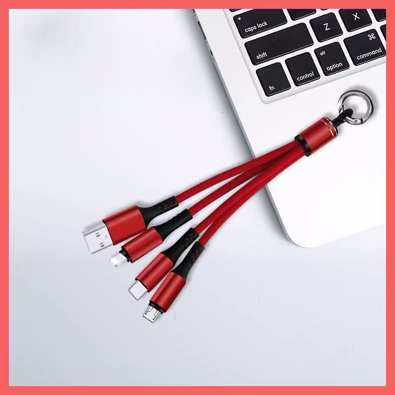 Tresser un câble de données trois en un pour Android avec trois câbles de données USB.