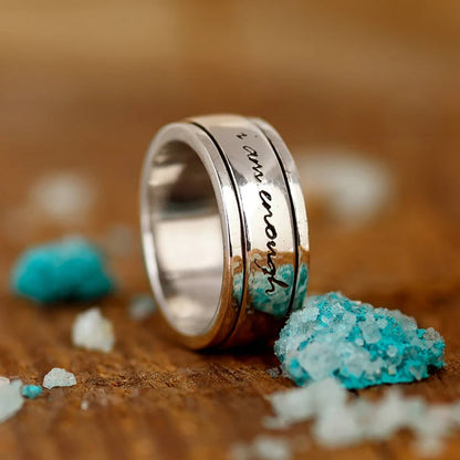 Nuevo anillo antiestrés giratorio con letras rotatorias