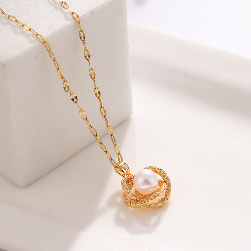 Collier en acier au titane pour femme avec pendentif creux nid d'oiseau imitation perle