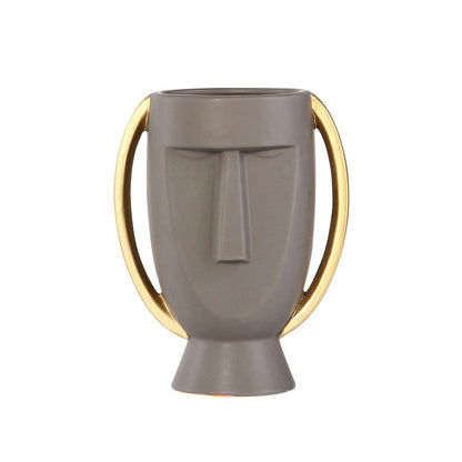 L'originalité du vase en céramique faciale de Northern Europe Limelight est contractuelle