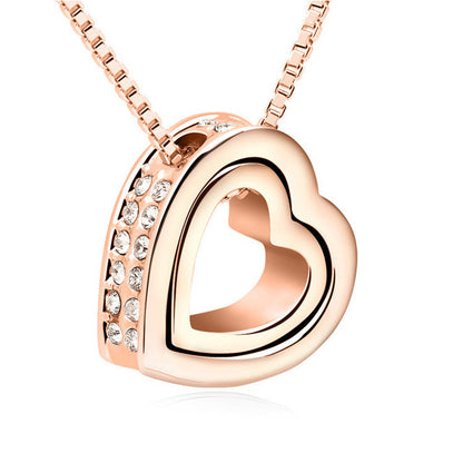 Collar corto con colgante de corazón doble de cristal
