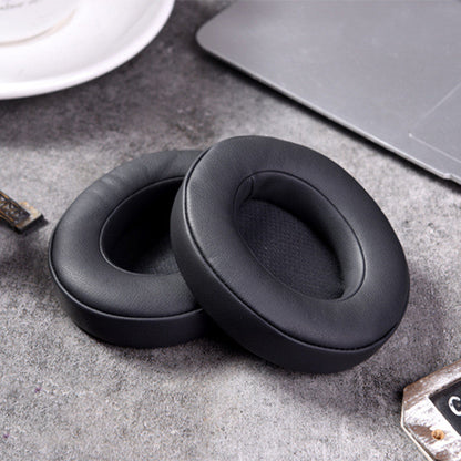 Une paire de manchons en éponge pour casque, cache-oreilles