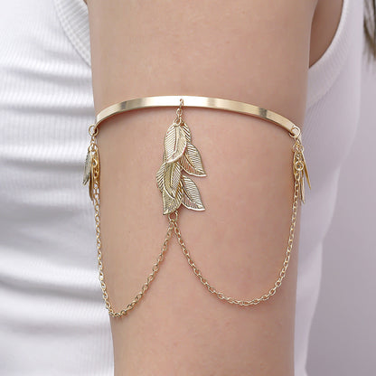 Handcrafted Gold-plated Geometric Cuff Bracelets And Boho-chic Metal Tassel Arm Rings With Vintage-inspired Exaggerated Water Drop Designs, Offering Unisex Luxury Accessories In Open Bangle Styles