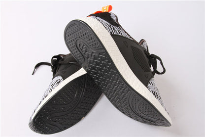 Chaussures de course tissées volantes