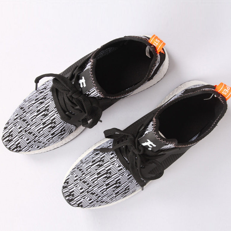 Chaussures de course tissées volantes