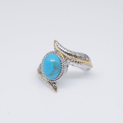 Zhen Rong vous souhaite de bonnes ventes pour ses nouveaux produits : Bague plume en turquoise verte incrustée extravagante de style européen et américain, bague colorée, bague de fiançailles.