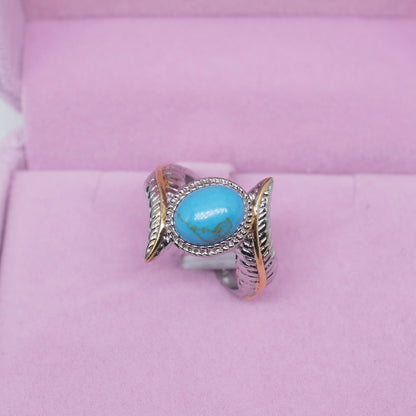 Zhen Rong vous souhaite de bonnes ventes pour ses nouveaux produits : Bague plume en turquoise verte incrustée extravagante de style européen et américain, bague colorée, bague de fiançailles.