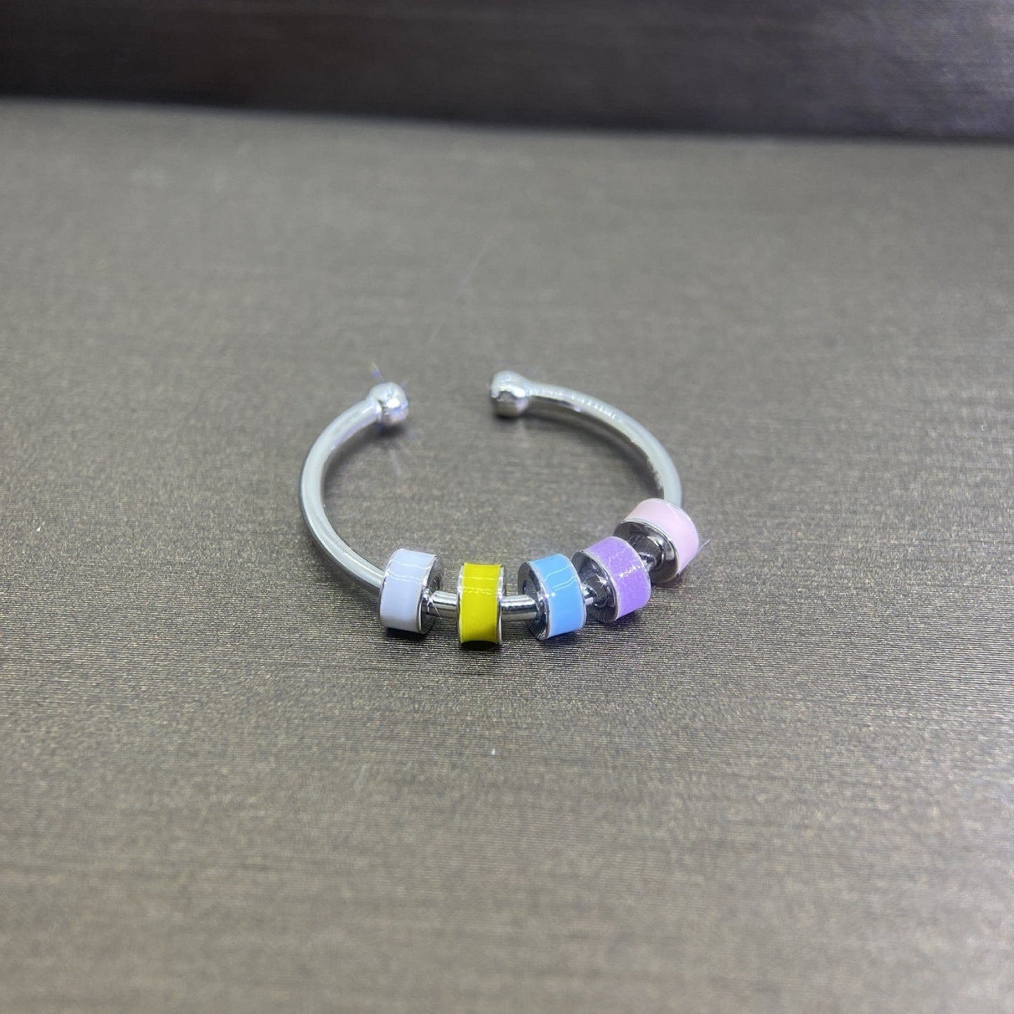 Rotating Enamel Fingertip Stress Relief Ring