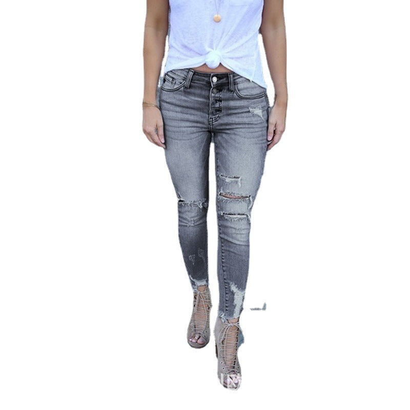 Jeans stretch moulants pour femme, délavés et troués, avec effet rehausseur de fesses