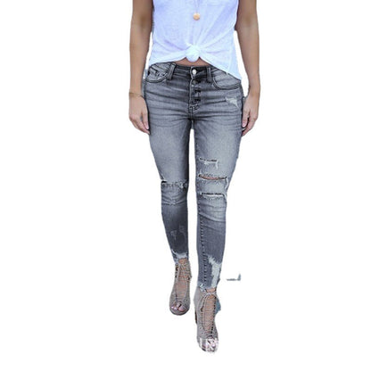 Jeans stretch moulants pour femme, délavés et troués, avec effet rehausseur de fesses