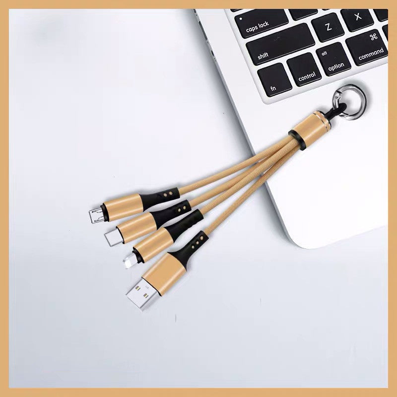 Tresser un câble de données trois en un pour Android avec trois câbles de données USB.