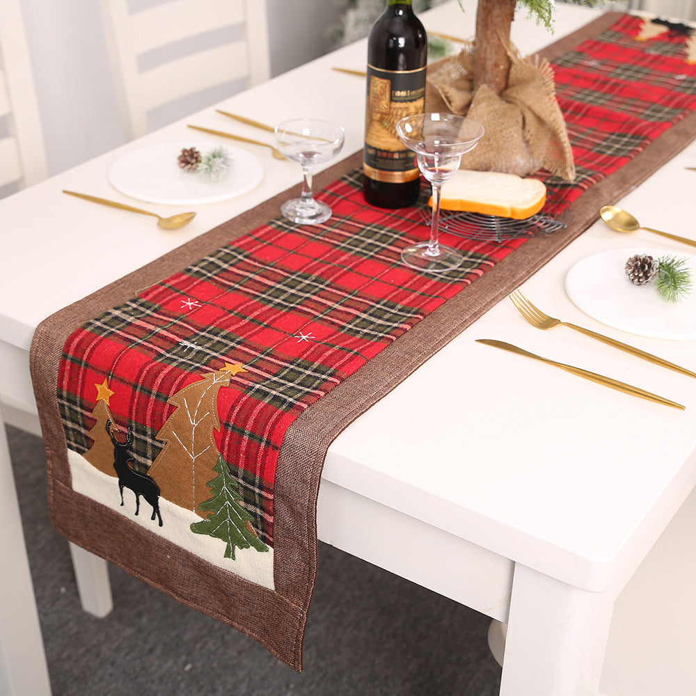 Salvamentel de mesa con diseño de alce y árboles