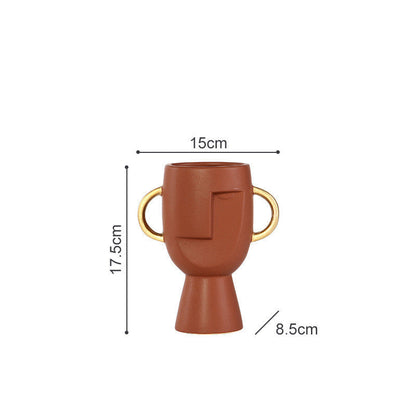 L'originalité du vase en céramique faciale de Northern Europe Limelight est contractuelle