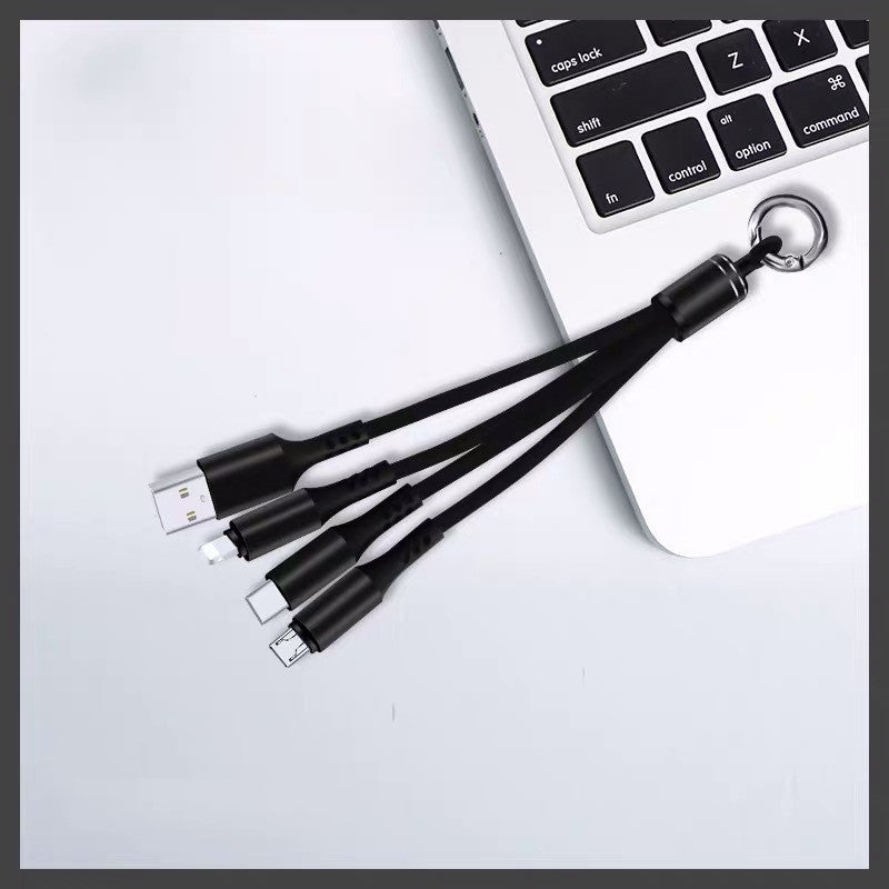 Tresser un câble de données trois en un pour Android avec trois câbles de données USB.