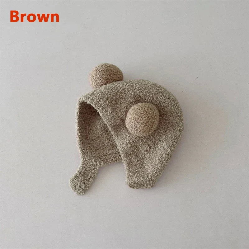Lindos sombreros de invierno cálidos para niños y niñas, gorros de lana con dobladillo de vellón y pompón, gorros de lana sólida con protección para las orejas, gorros suaves para recién nacidos.