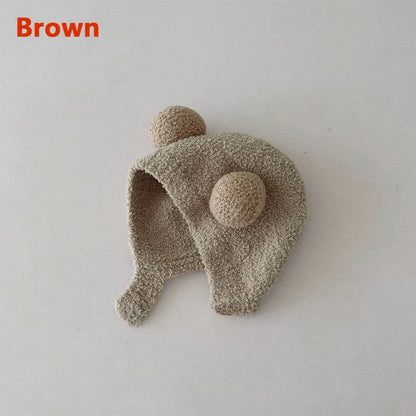 Lindos sombreros de invierno cálidos para niños y niñas, gorros de lana con dobladillo de vellón y pompón, gorros de lana sólida con protección para las orejas, gorros suaves para recién nacidos.