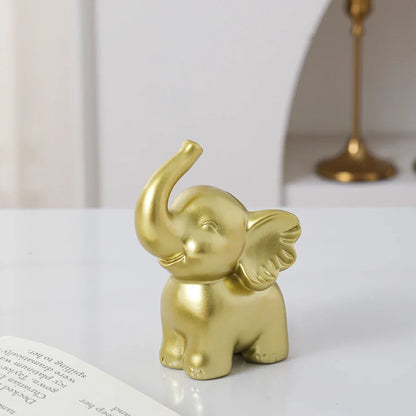 1pc Collectible figurine  , Simple modern black and gold elephant ornament home decor small sculpture.