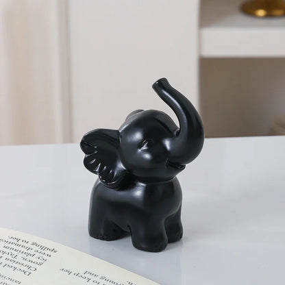 1pc Collectible figurine  , Simple modern black and gold elephant ornament home decor small sculpture.