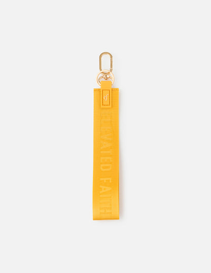 Llavero grande con logo amarillo