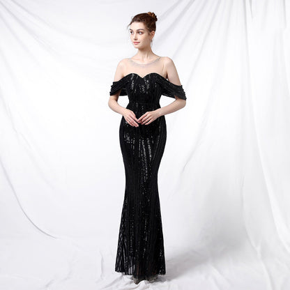 Longue robe à paillettes avec fente avant et arrière