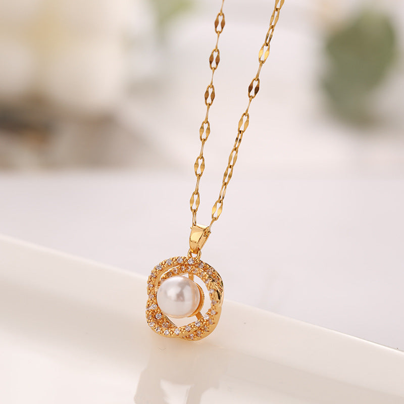Collier en acier au titane pour femme avec pendentif creux nid d'oiseau imitation perle