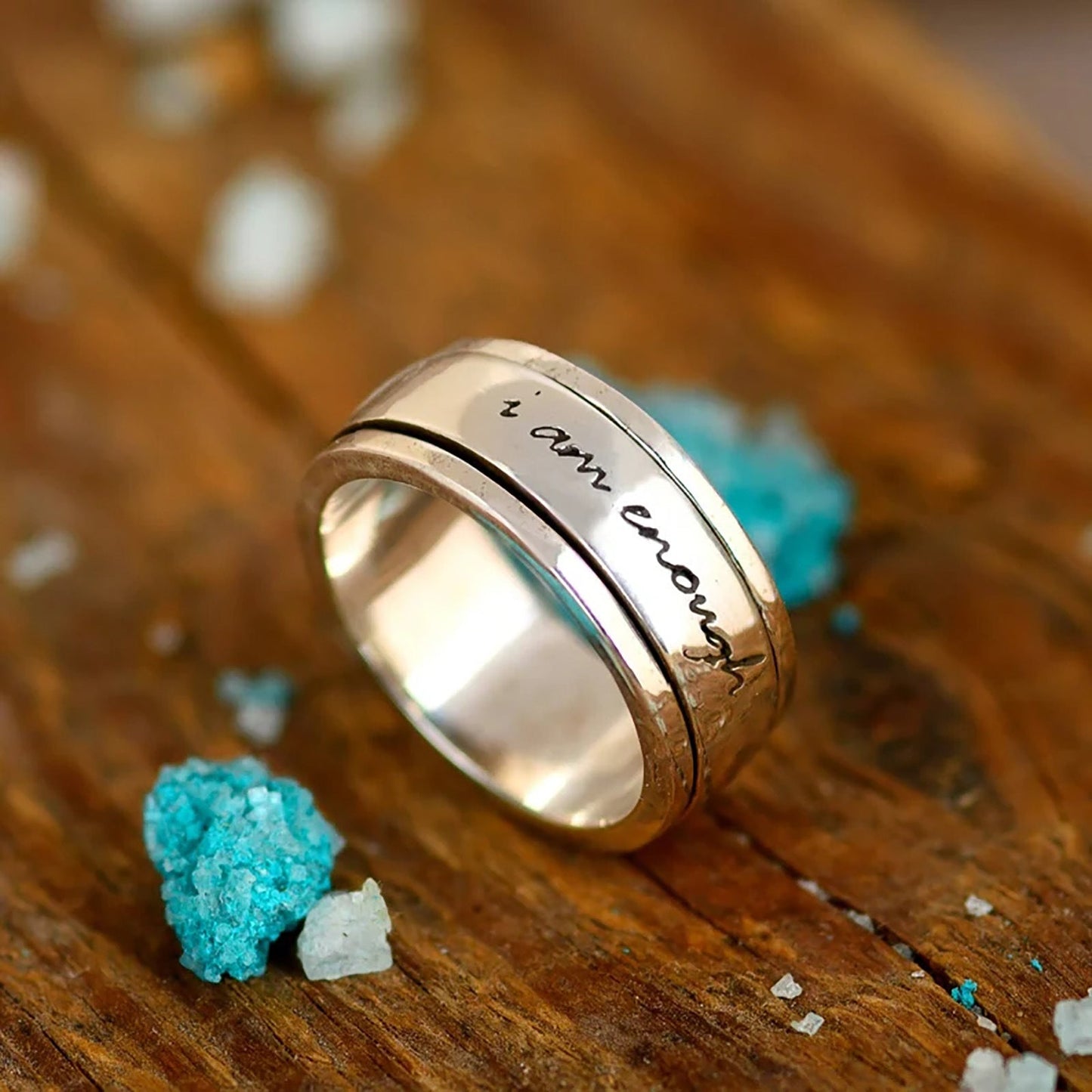 Nuevo anillo antiestrés giratorio con letras rotatorias