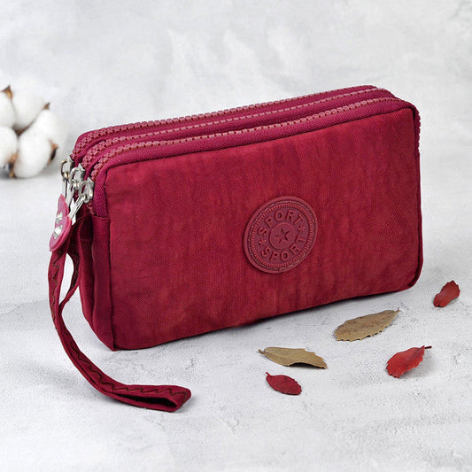 Pochette en toile à trois compartiments zippés