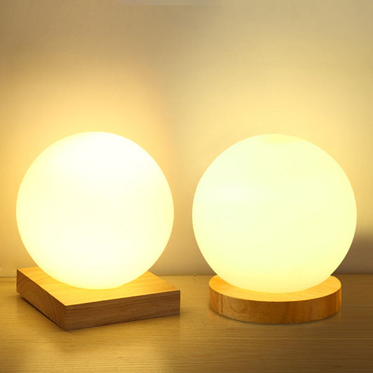 Lampe de table en bois massif à boule créative en verre blanc laiteux à intensité variable
