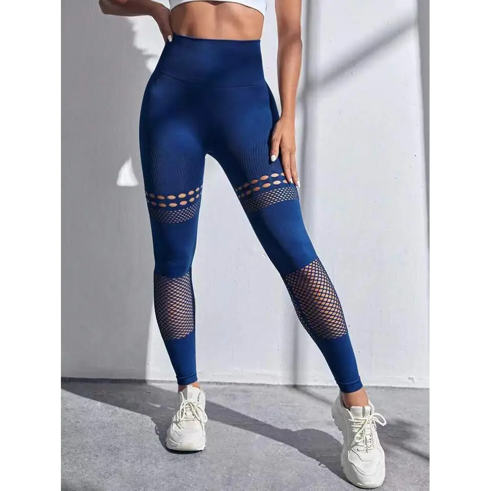 Pantalones de yoga sin costura ahuecados con paneles de malla
