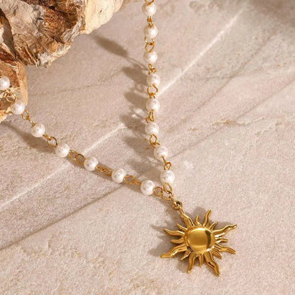 Stainless Steel Pearl Necklace with Gold Sun Pendant